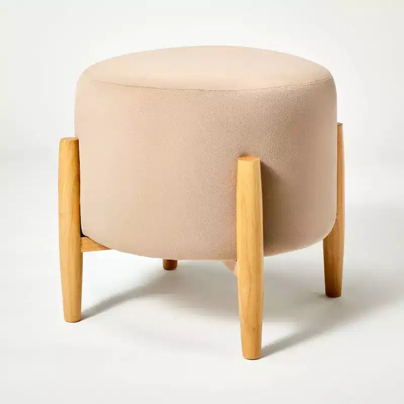 Ottoman rond en velours avec pieds en bois