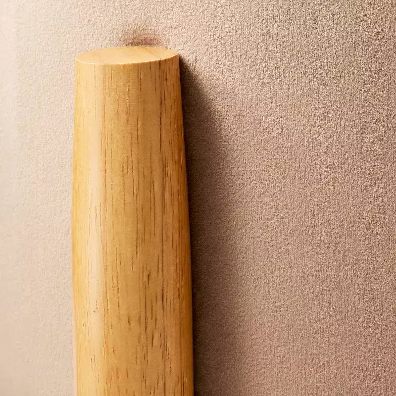Ottoman rond en velours avec pieds en bois